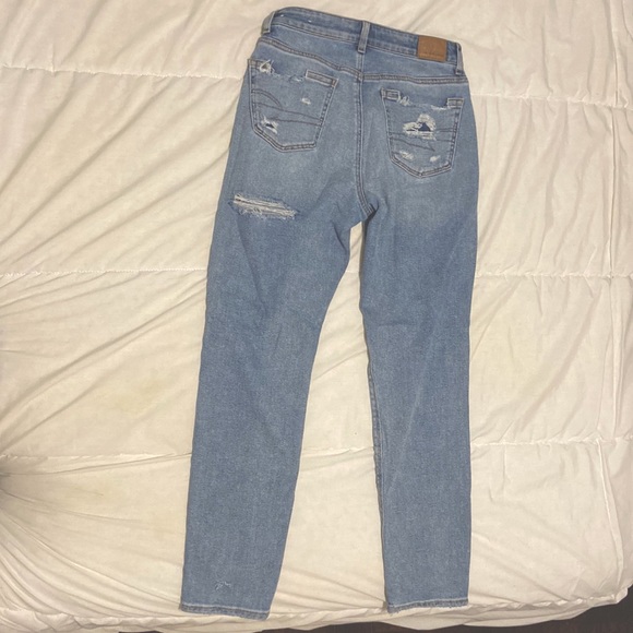 Blue ripped American Eagle jeans in size 0 - Picture 2 of 3